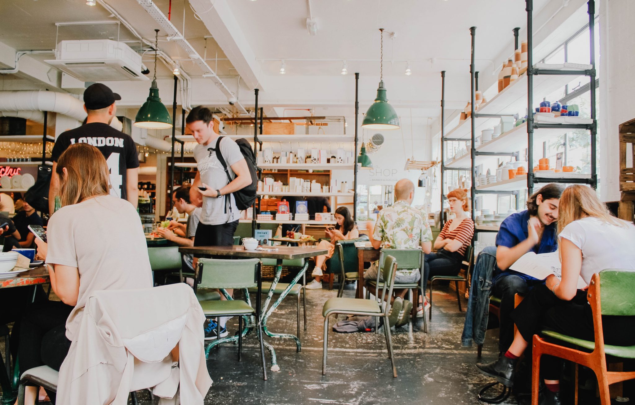 People talking and eating happily in a café