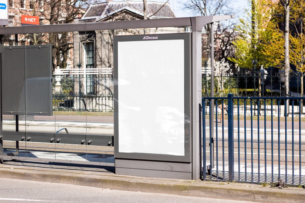 An empty bus station with an empty ad location