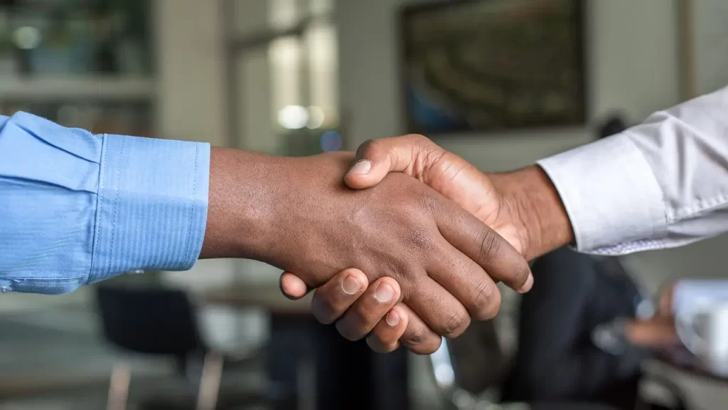 Close up of people shaking hands