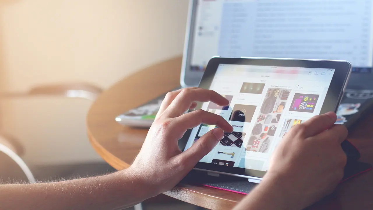 Person using a shopping app on a tablet