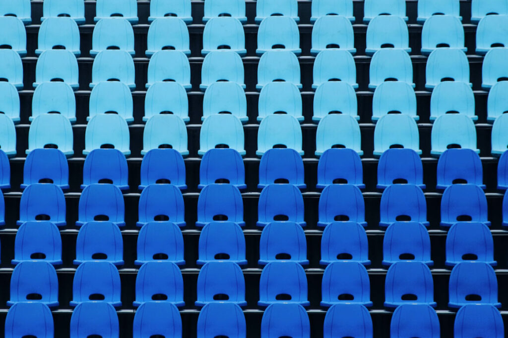 Empty blue and light blue arena seats