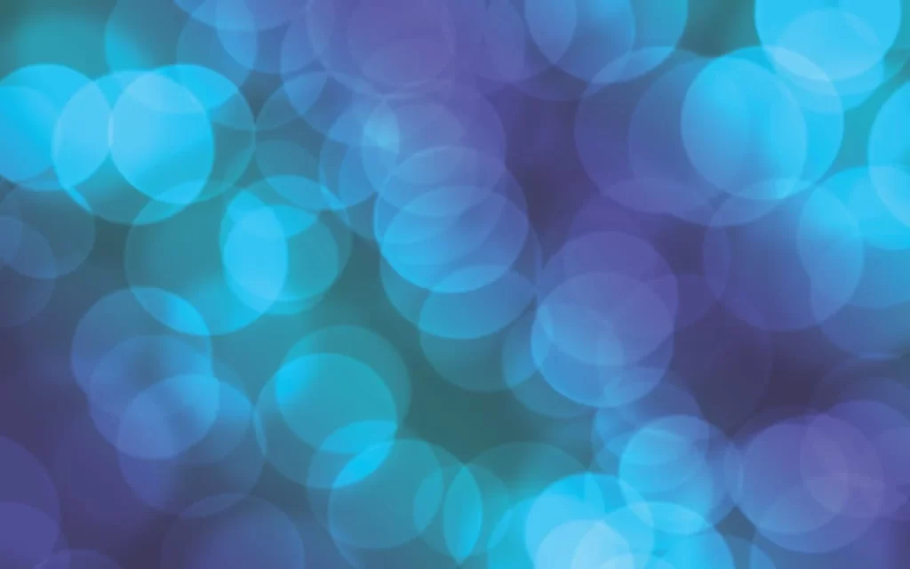 Lens flares on a blue and purple gradient