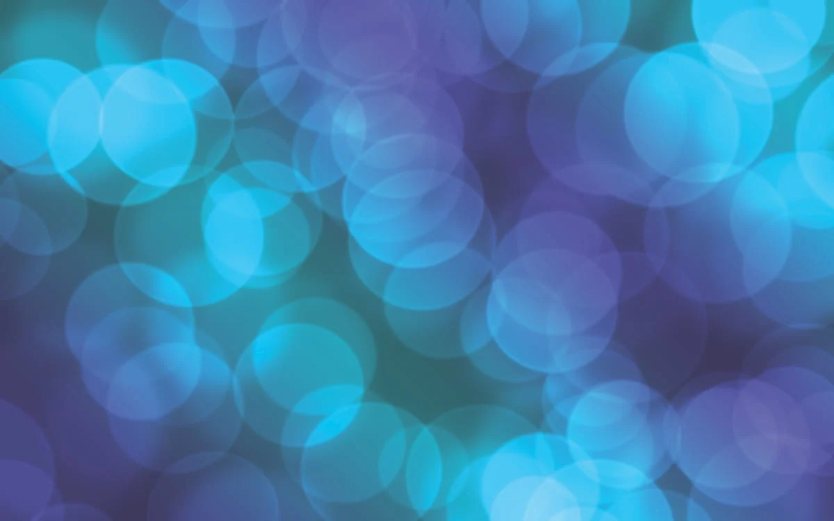 Lens flares on a blue and purple gradient
