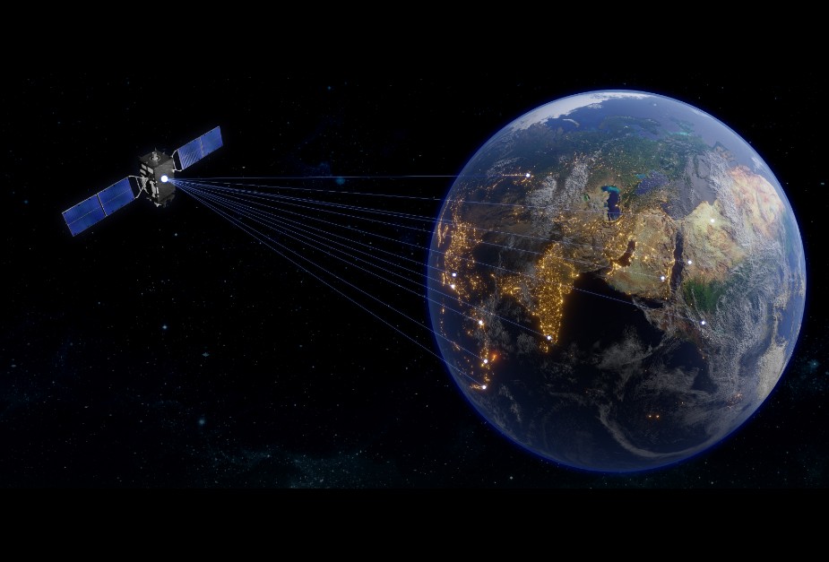 Satellite in outer space beaming signals to multiple locations on earth