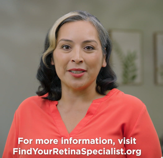 Woman in a pink button shirt looking at the camera with text at the bottom